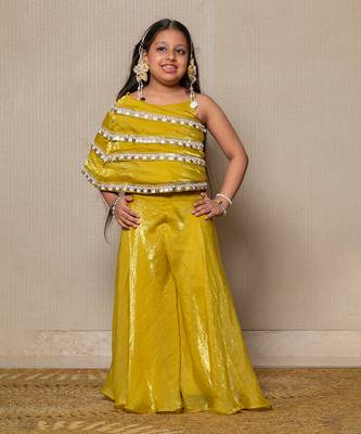 Vibrant golden-yellow ensemble with an asymmetrical top and wide-legged pants 1