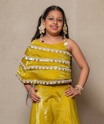 Vibrant golden-yellow ensemble with an asymmetrical top and wide-legged pants 2