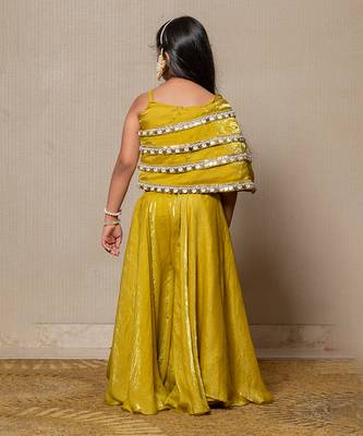 Vibrant golden-yellow ensemble with an asymmetrical top and wide-legged pants 3
