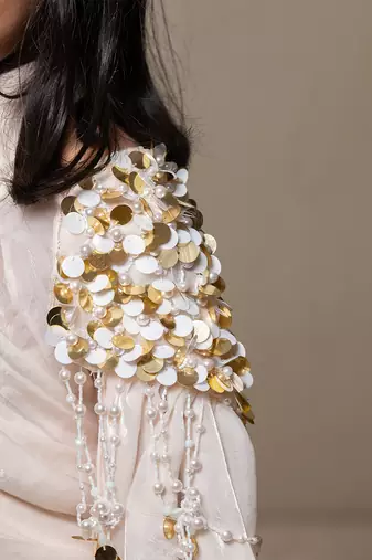 Intricate sequin embellishment cape with halter neck top and layered skirt