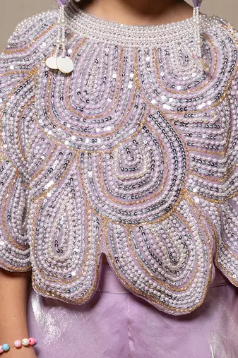 Lilac coloured crop top with heavy embroidered cape and pants