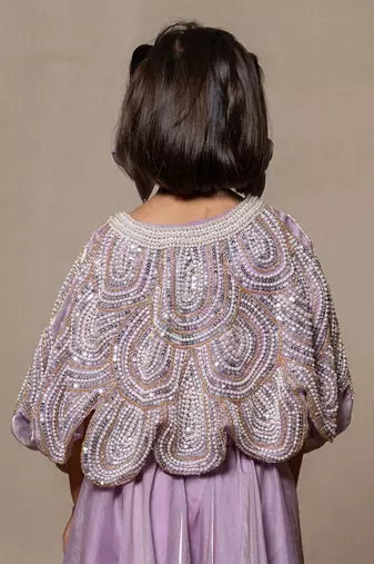 Lilac coloured crop top with heavy embroidered cape and pants