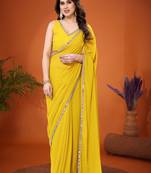 Yellow embellished pure georgette  saree with blouse piece