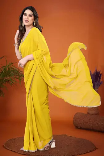 Yellow embellished pure georgette  saree with blouse piece