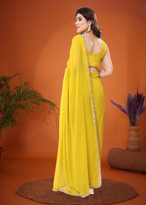 Yellow embellished pure georgette  saree with blouse piece 3