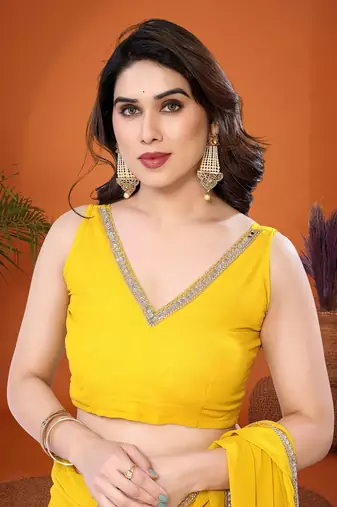 Yellow embellished pure georgette  saree with blouse piece