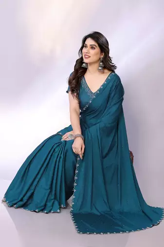 Teal embellished pure crepe  saree with blouse piece