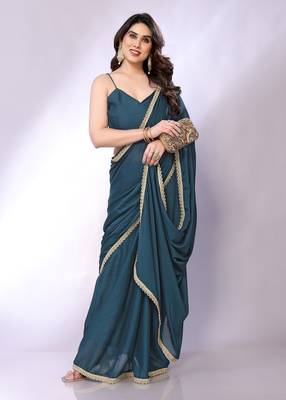 Teal embellished pure georgette  saree with blouse piece 1