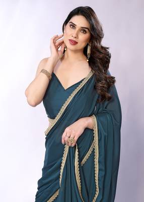 Teal embellished pure georgette  saree with blouse piece 3
