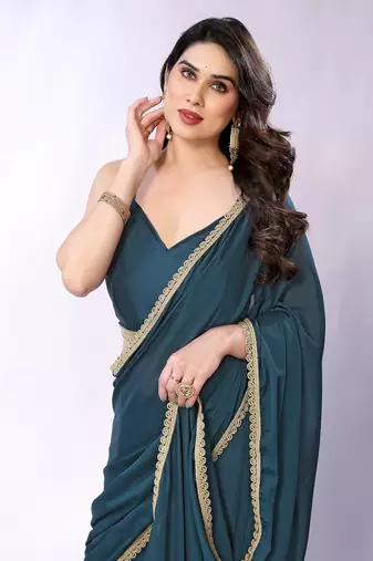 Teal embellished pure georgette  saree with blouse piece