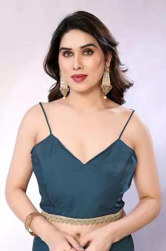 Teal embellished pure georgette  saree with blouse piece