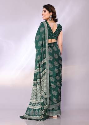 Green embellished poly chiffon  saree with blouse piece 4
