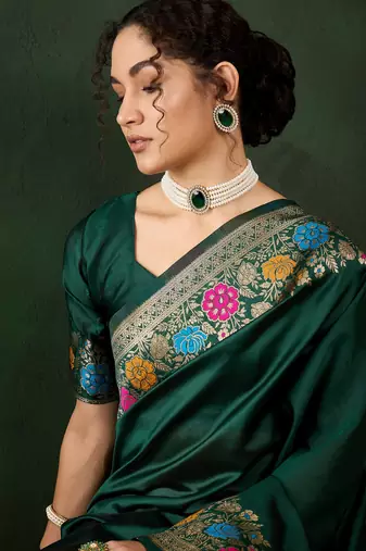 Green poly silk Faux Banarasi saree with heavy zari multi-weaving design.