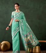 Women's sea green color poly cotton heavy banarasi zari multi weaving work saree 