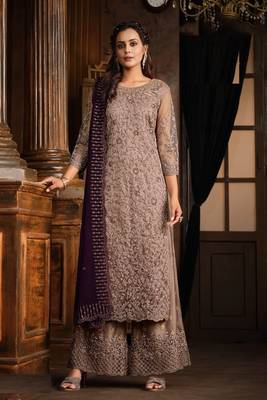 Lavender net heavy embroidery semi stitched suits 1