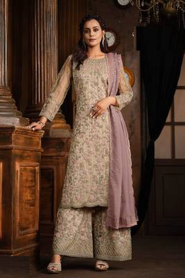 Light purple net heavy embroidery semi stitched suits 1
