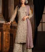 Light purple net heavy embroidery semi stitched suits
