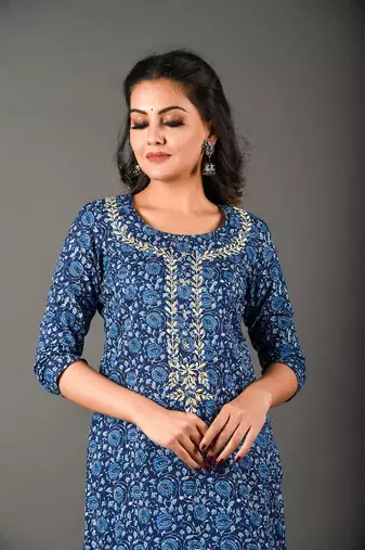 Indigo piece is an evergreen piece and comes with beautiful zardozi work with blue striped pants.