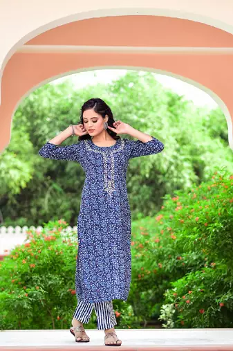 Indigo piece is an evergreen piece and comes with beautiful zardozi work with blue striped pants.