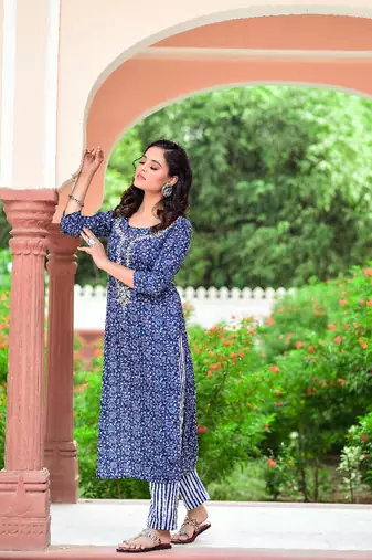 Indigo piece is an evergreen piece and comes with beautiful zardozi work with blue striped pants.