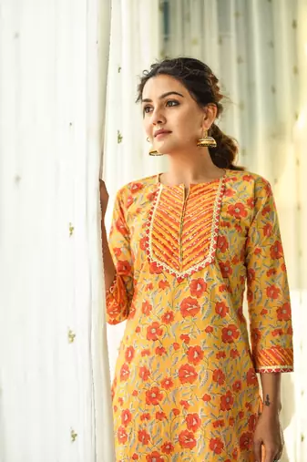 Yellow and orange 2 piece floral regular fit kurta and orange stripped palazzo