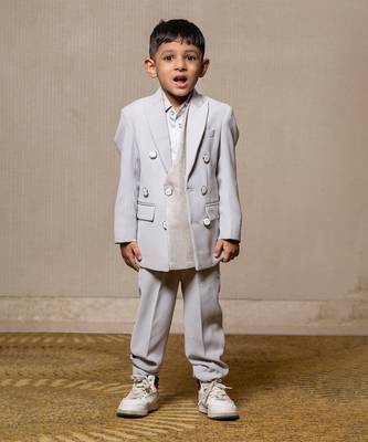 Stylish light grey double-breasted suit with silver accents 1