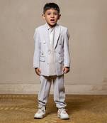 Stylish light grey double-breasted suit with silver accents