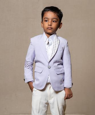 Trendy lavender blazer with metallic stud embellishments paired with classic white trousers 3