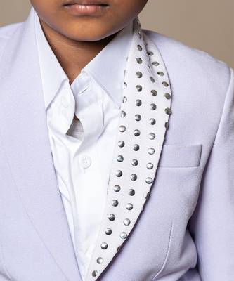 Trendy lavender blazer with metallic stud embellishments paired with classic white trousers 4