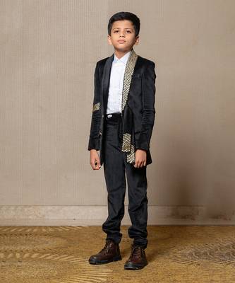 Luxurious blackvelvet suit with studded embellishments 1