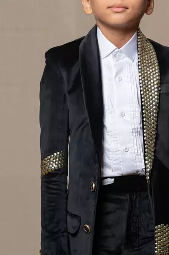 Luxurious blackvelvet suit with studded embellishments