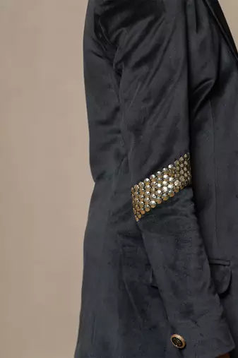Luxurious blackvelvet suit with studded embellishments