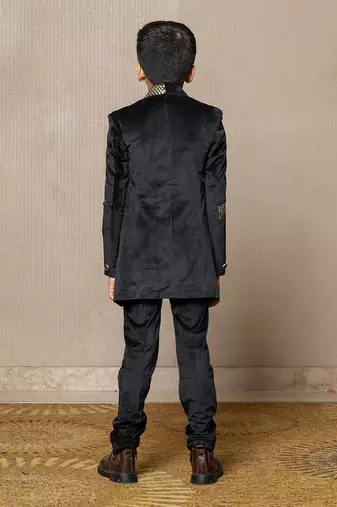 Luxurious blackvelvet suit with studded embellishments