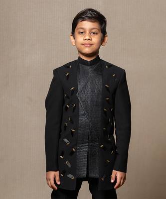 Modern blacksuit with embroidered gold accents and a high mandarin collar 2