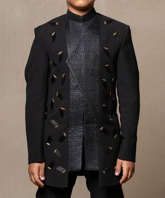 Modern blacksuit with embroidered gold accents and a high mandarin collar 3