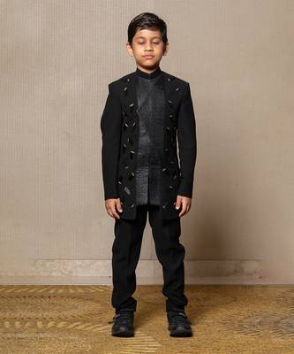 Modern blacksuit with embroidered gold accents and a high mandarin collar 4