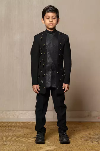 Modern blacksuit with embroidered gold accents and a high mandarin collar