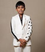 Modern off-white suit with blackaccents and stylish embroidered sleeve detail