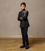 Elegant blackbandhgala with gold embroidery, paired with matching tailored pants