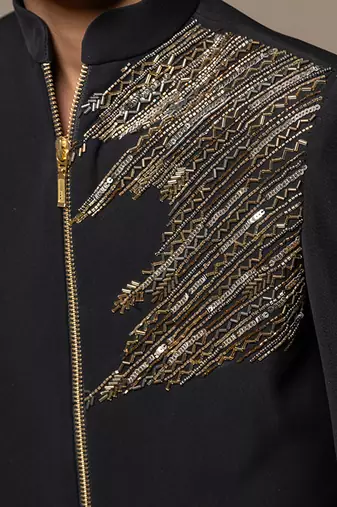 Elegant blackbandhgala with gold embroidery, paired with matching tailored pants