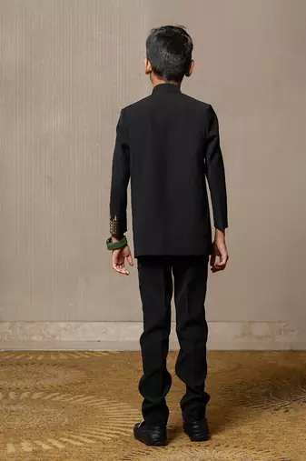 Elegant blackbandhgala with gold embroidery, paired with matching tailored pants