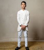 Intricately embroidered off-white bandhgala with matching white kurta and pants