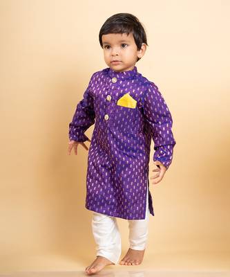 Vibrant purple kurta with golden motifs and yellow pocket square, paired with classic white churidar pants 1