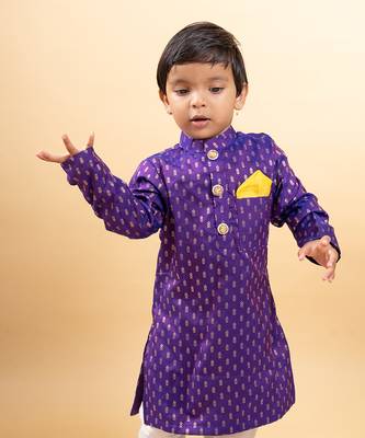 Vibrant purple kurta with golden motifs and yellow pocket square, paired with classic white churidar pants 2