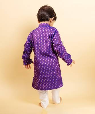 Vibrant purple kurta with golden motifs and yellow pocket square, paired with classic white churidar pants 3