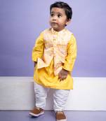 Vibrant yellow kurta set with an embroidered peach nehru jacket, paired with classic white churidar pants