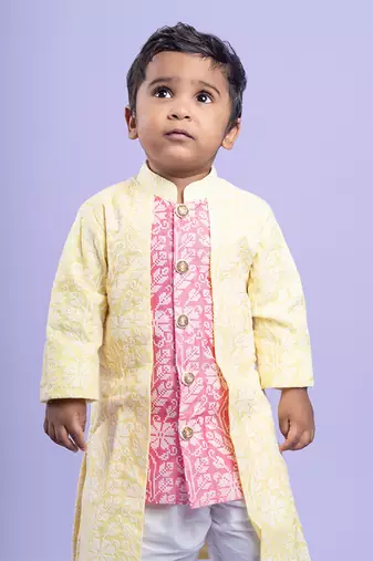 Traditional pink kurta with embroidered yellow jacket and white dhoti pants