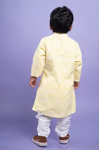 Traditional pink kurta with embroidered yellow jacket and white dhoti pants