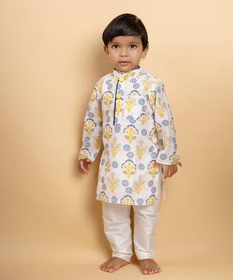 Vibrant floral printed kurta paired with classic white pants 1