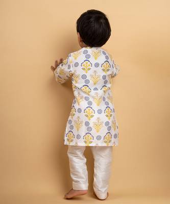Vibrant floral printed kurta paired with classic white pants 3